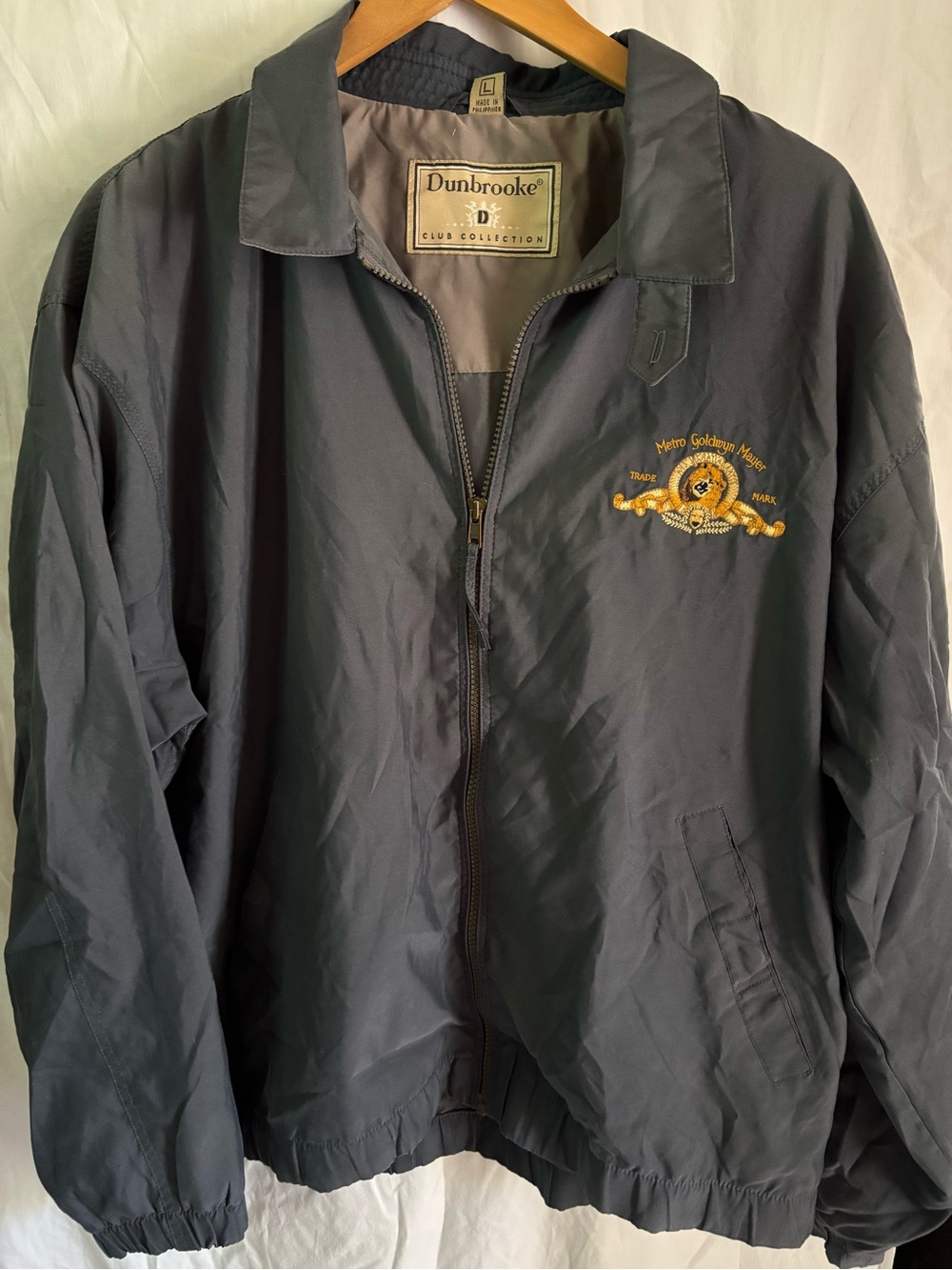 Dunbrooke Men's Navy Zip Front Jacket with Embroidered Metro Goldwyn Mayer logo